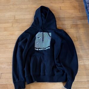 The North Face Black Hoodie with White Striped Logo